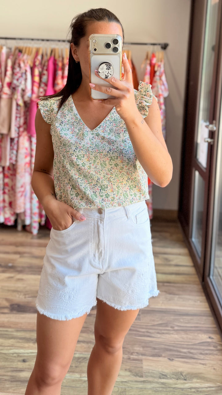 Short en jean blanc Omega